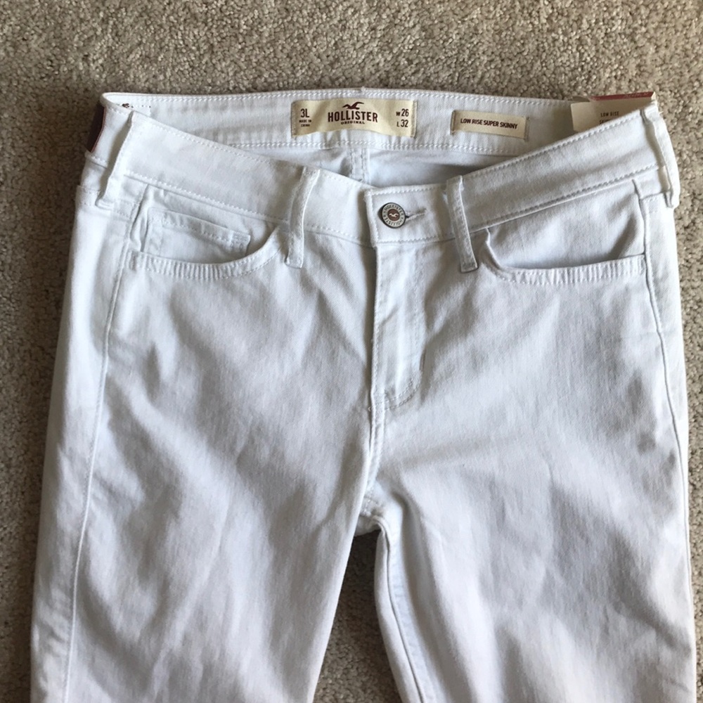 Low rise (but they seem like mid rise) white Jeans